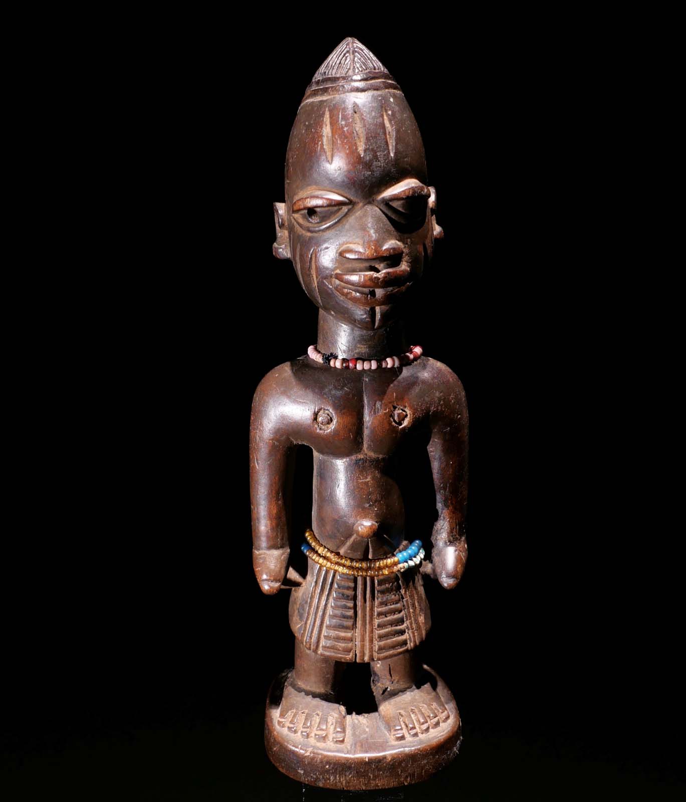 Männliche Figur aus dem Zwillingskult „Ibedji“, Yoruba / Nigeria. Frühes 20.Jhdt. H 25 cm, 1500.- €