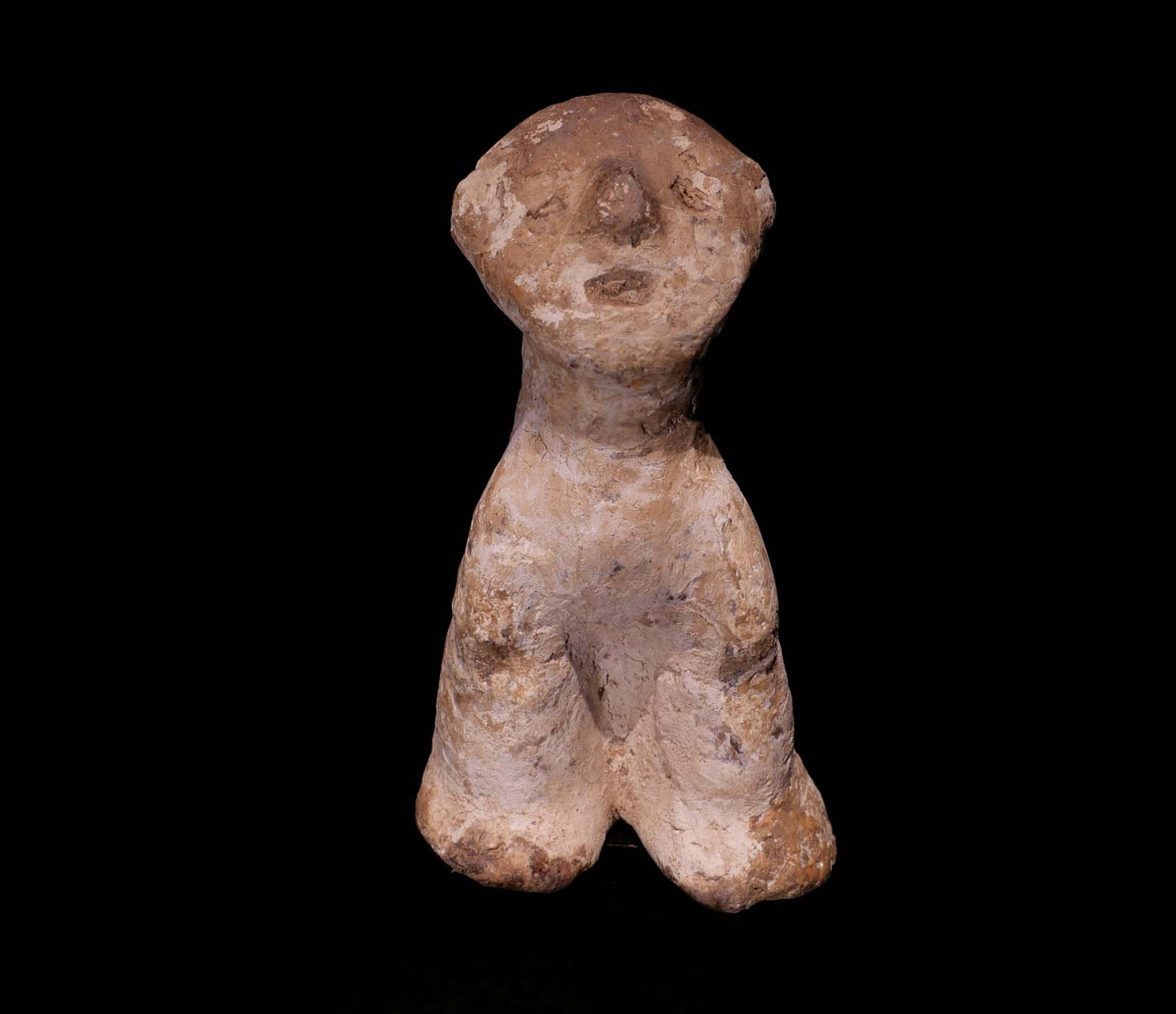 Kleine Figur aus dem Voodoo-Kult.Terrakotta /  Kaolin. Fon / Benin. H 12 cm, 400.- €